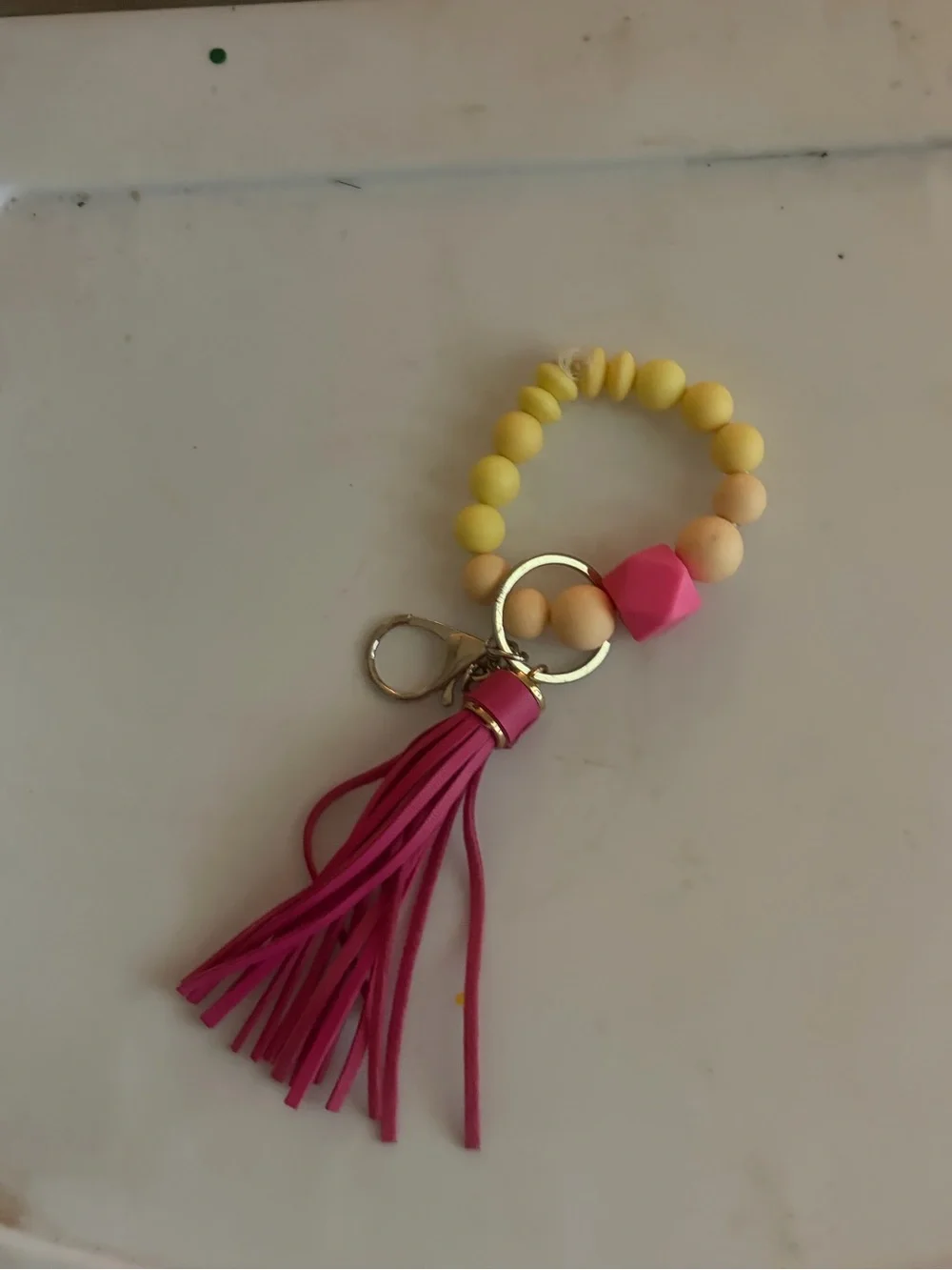 Yellow Bead Bracelet Keychain with Pink Tassel